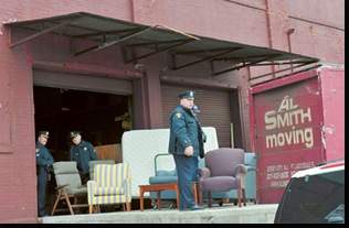 Police respond to a call at Al Smith Moving at 33 Pacific Ave. in Jersey City where an unidentified object fell through the roof, Wednesday, February 18, 2009. -- REENA ROSE SIBAYAN / THE JERSEY JOURNAL