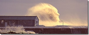 **Minimum fee Â£250 applies to use of this picture**

A spooky face is created by the spray from a wave hitting the cobb at Lyme Regis, Dorset in this lucky shot taken by photographer Simon Emmett on February 4 2014.