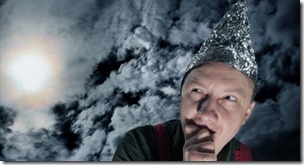 Scared-Suspecting-Man-Wearing-A-Foil-Hat-Against-Dark-Stormy-Sky-Shutterstock-800x430