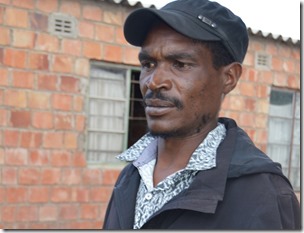 Mr Thabisani Ngwenya with one of the stone allegedly thrown by goblins