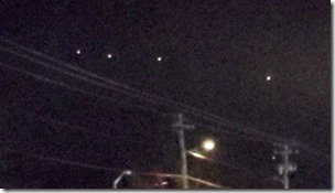 1_Red-glowing-UFO-fleet-flying-over-lake-vanished-in-mid-air
