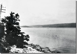 (Original Caption) Authentic Picture of Loch Ness Monster. Scotland: After a four weeks wait the searching party organized by Sir Edward Mountain to seek the Loch Ness monster, has been rewarded. The "monster" had been observed by watchers no less than 21 times. Photographs obtained by the watchers clearly prove the existence of some huge and strange animal in the loch. The above photograph, taken under extreme difficulty, shows the "monster" -- the dark object indicative of a large form beneath the water.