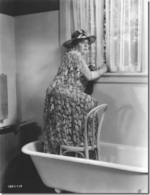 Alison Skipworth, Publicity Portrait Standing in Bathtub on-set of the Film, "Madame Racketeer", Paramount Pictures, 1932. (Photo by: Universal History Archive/Universal Images Group via Getty Images)