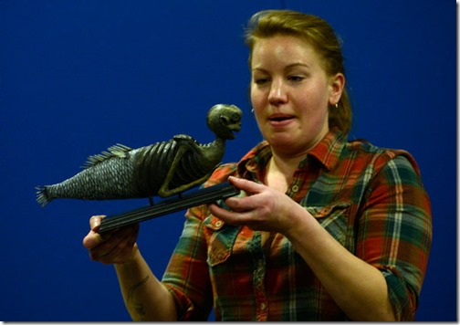 DENVER, CO - MARCH 9: Brittany Janaszak from the American Museum of Natural History in New York installs the Feejee mermaid made famous by P.T. Barnum. The original was believed to be destroyed in a fire, but some think this one, discovered in a museum collection in 1973, may be it. Work continues at the Denver Museum of Nature and Science as crews install the new temporary exhibition, Mythic Creatures: Dragons, Unicorns, and Mermaids. Legendary creatures on display will include items such as a 10-foot-tall model of a kraken, as well as real creatures, artifacts and fossils. The exhibition opens March 20, 2015, and runs through Sept. 7, 2015. (Photo by Kathryn Scott Osler/The Denver Post via Getty Images)