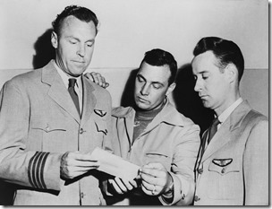 pilots-e-j-smith-kenneth-arnold-and-ralph-e-stevens-look-at-news-photo-1710561480