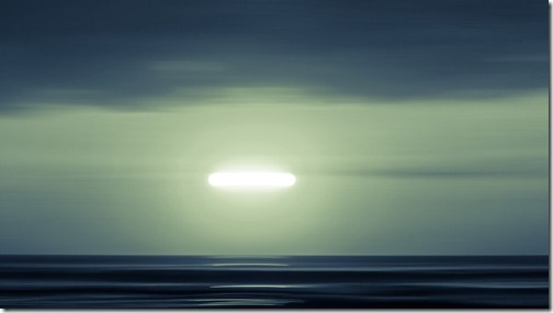 An abstract image of the moon over the ocean in South America.